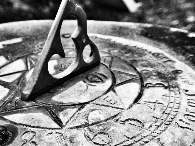 A detailed close-up of a prop from the drama, a vintage compass, with subtle symbolic engravings, hinting at themes of destiny, guidance, and hidden paths within the overarching narrative.