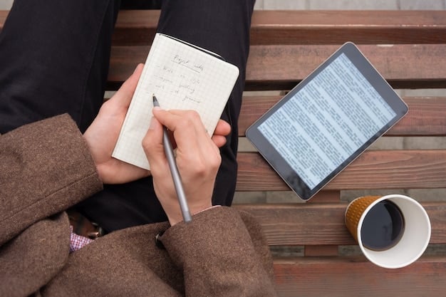 A person taking notes while watching an English-language drama on a tablet, with a pen in hand and a notebook on the table.